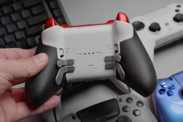 Back side of red wireless Xbox gaming controller