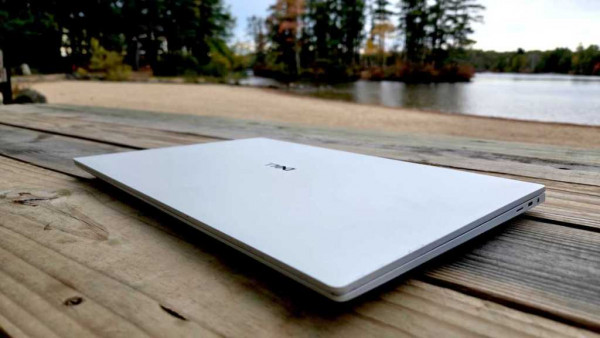 Dell 16 Premium laptop closed at lake