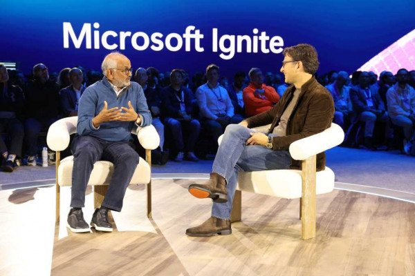 Adobe CEO Shantanu Narayen (L) and Judson Althoff, CEO of Microsoft