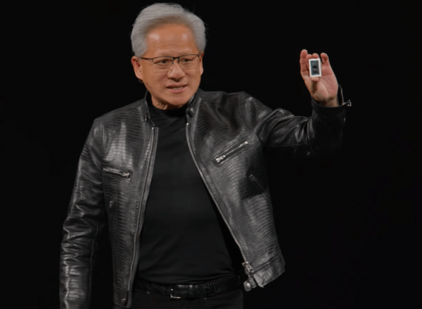 Nvidia Jensen Huang holds up RTX Spark chip